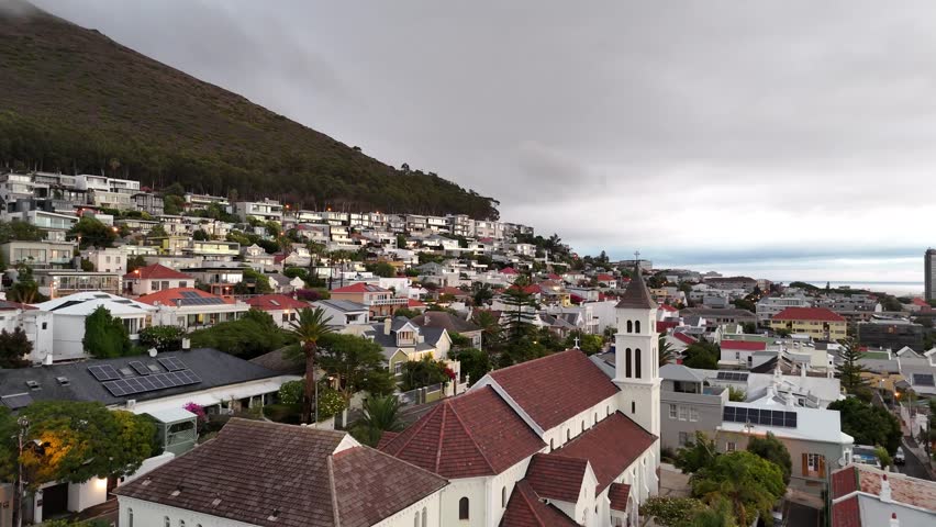 aerial cityscape view of Cape Town South Africa drone fly above church and residential area