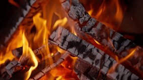 Firewood and coals burn in the fireplace. High quality 4k footage - Powered by Shutterstock - Get 15% off with code: PIKWIZARD15