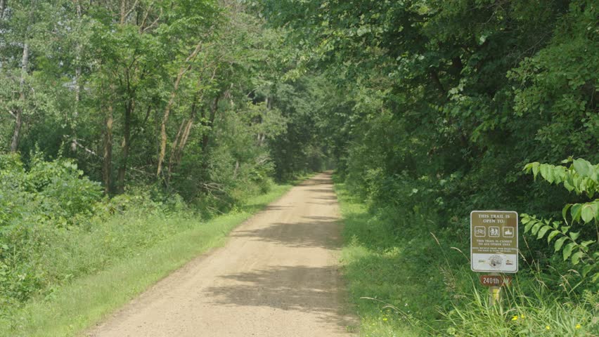 The Gandy Dancer State Trail Passes Near Luck, Wisconsin, United States. Wide Shot