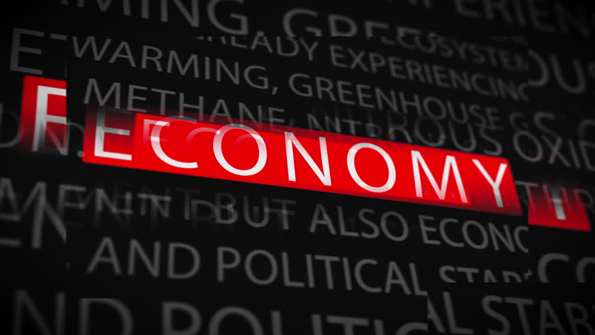 Close-up of printed economic text with the word 'ECONOMY' highlighted in red, set in a continuous loop format for motion backgrounds and financial storytelling.