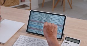Spreadsheet on tablet screen and calculator support efficiency of online accounting process. Workplace of accountant with notepad and keyboard on desk, digital document with numbers on touchscreen - Powered by Shutterstock - Get 15% off with code: PIKWIZARD15