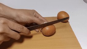 A hard-boiled egg cut in half reveals a bright yellow yolk. A healthy, delicious, and protein-rich breakfast choice. - Powered by Shutterstock - Get 15% off with code: PIKWIZARD15