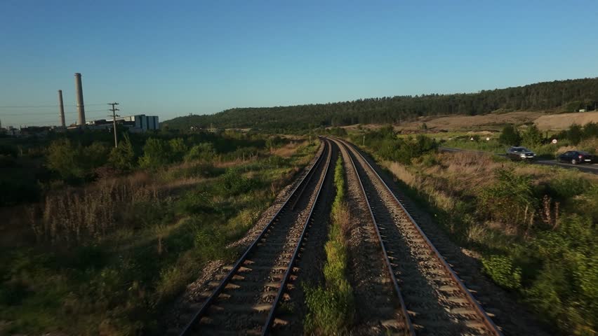 Aerial Drone View of Railway Tracks at Sunset – Scenic Countryside