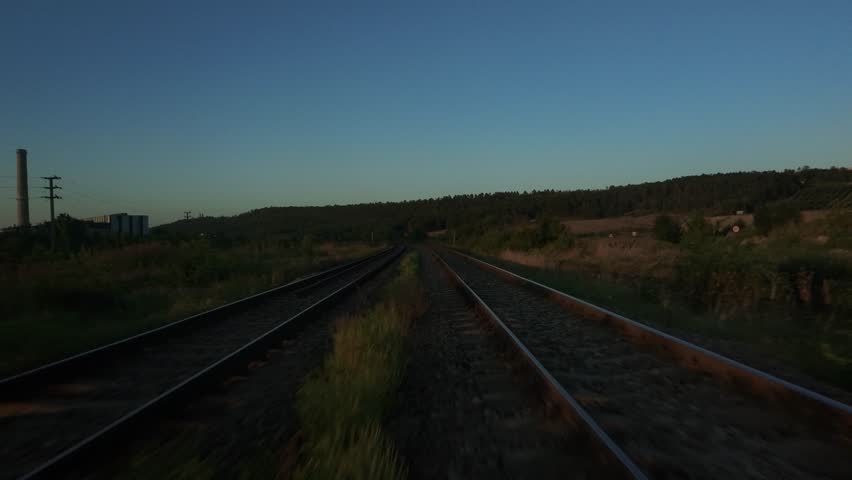 Sunset Railroad Perspective – Cinematic Low Angle Footage