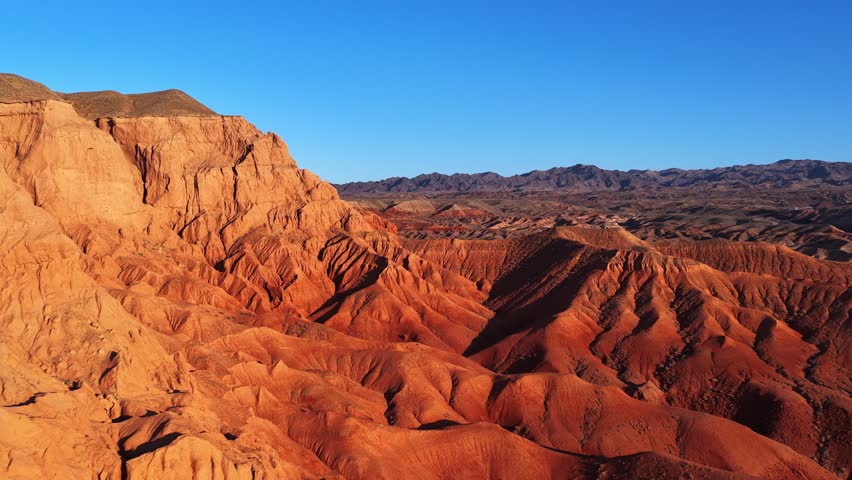 The Red Mountains of Boguta. Mountainous clay terrain. The view from the drone. A summer evening. National Nature Park. It looks like Mars.