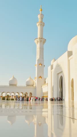 Static vertical high quality colorful 4K Timelapse Sheikh Zayed Grand Mosque at sunset, Abu Dhabi, UAE. Tourist sightseeing famous grand mosque in United arab emirates
