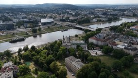 Drone footage of urban architecture with tall buildings, geometric lines, and structural patterns, capturing modern city design, skyline shapes, and architectural rhythm. - Powered by Shutterstock - Get 15% off with code: PIKWIZARD15