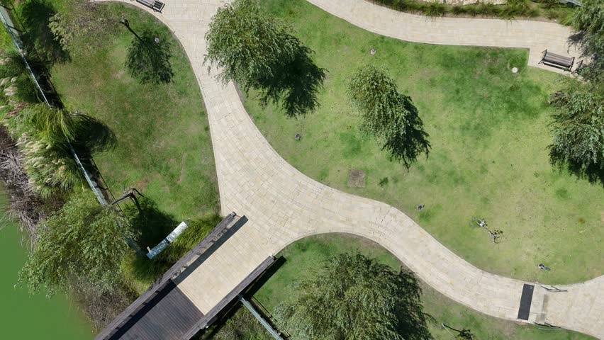 Stunning drone footage of a small island in the middle of a calm lake
