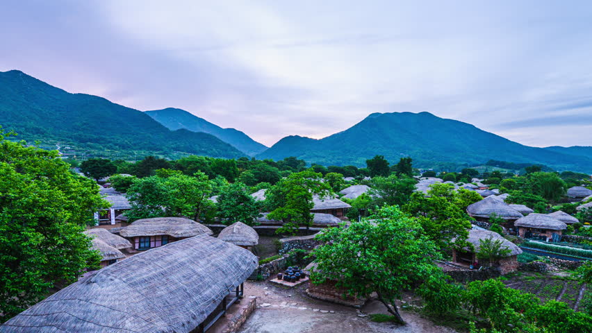 4k time lapse video (Zoom Out)of morning view of traditional Korean thatched houses at Nakaneupseong Folk Village, Suncheon, Jeollanam-do, South Korea.