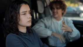 Toxic relationship conflict inside a car, with an aggressive man shouting at his girlfriend. The woman looks upset and silent, showing emotional stress and abuse. - Powered by Shutterstock - Get 15% off with code: PIKWIZARD15