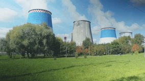 Thermal Power Station Chimneys Overlooking Urban Park - Powered by Shutterstock - Get 15% off with code: PIKWIZARD15