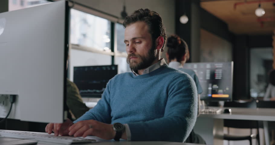 Reading, computer and business man in office for online review, proofreading article and research. Creative, news agency and person on pc for editing report, website portfolio and story publication