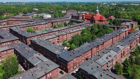Aerial view of the historic Nikiszowiec District in Katowice, Poland. Unique former mining settlement with characteristic red brick buildings. Important example of industrial heritage. - Powered by Shutterstock - Get 15% off with code: PIKWIZARD15