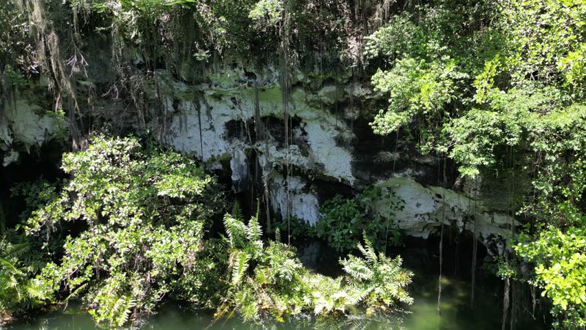 Drone capture of Parque Los Tres Ojos lagoon, Dominican Republic — unique natural attraction in Santo Domingo