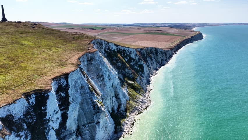 Stunning aerial view of Cap Blanc Nez cliffs overlooking the blue waters of the English Channel in France