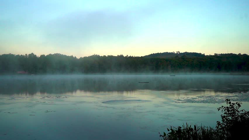 Moody foggy morning on the lake
