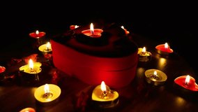 Romantic Valentine’s Day scene with glowing candles, red heart, and rose petals. Perfect for love, wedding, celebration, and romantic holiday designs. - Powered by Shutterstock - Get 15% off with code: PIKWIZARD15