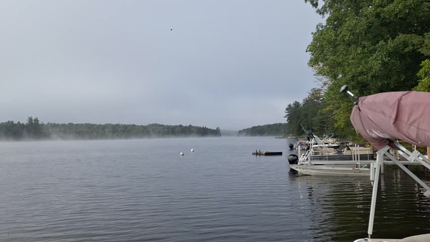 Sun rising over the fog covered, Canada Lake, in the Adirondacks.