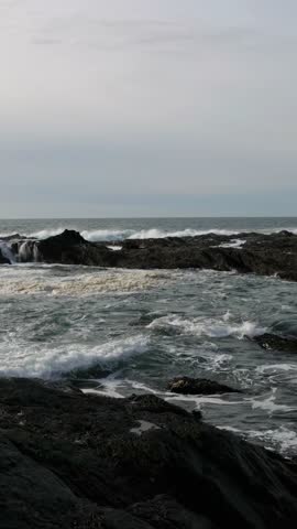 Waves Crashing on Rugged Rocks along the Beautiful Vancouver Island Coast, British Columbia, Canada