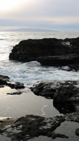 Serene Pacific Ocean Waves Breaking on Rocky Shores of Vancouver Island, British Columbia, Canada