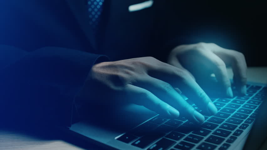 Businessman using laptop with virtual digital tax icons, charts, and data management tools. Ideal for fintech, tax filing, and online accounting themes.