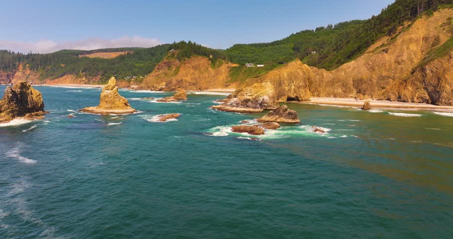 Scenic Aerial of Forested Headlands and Coastal Beaches in Oregon