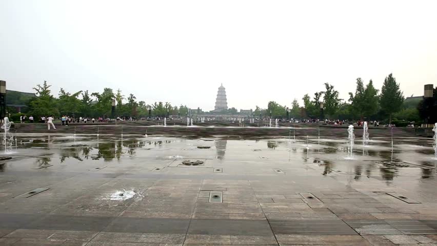 A wide, scenic view of a public plaza in Xi