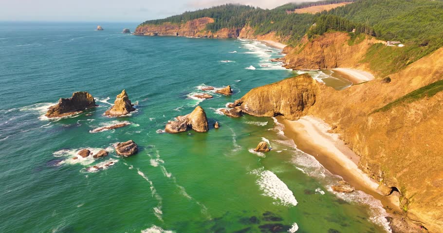 Wide Aerial Shot of Rugged Oregon Coastline with Expansive Horizon