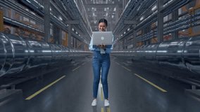 Full Body Of An Asian Female Worker Standing With Her Laptop In a In Big Warehouse Filled With Metal Pipes, She Observes By Looking Around Before She Come To Concentrating With Her Laptop - Powered by Shutterstock - Get 15% off with code: PIKWIZARD15