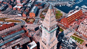 Flight at the clock tower of Custom House Tower, MA, USA. Bright city panorama from top view on sunny day. - Powered by Shutterstock - Get 15% off with code: PIKWIZARD15
