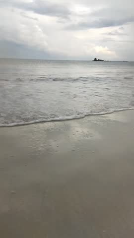 The sound of waves crashing on the coast