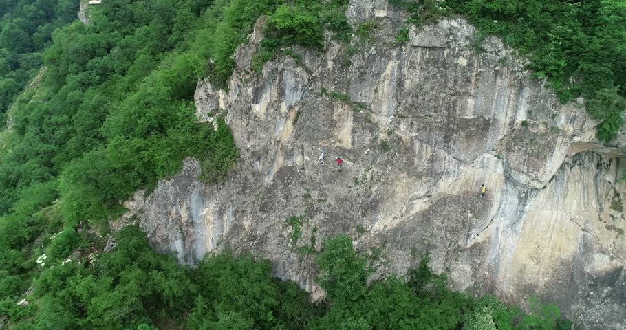 A Beautiful and Lush Mountain Landscape Featuring Dense Greenery Alongside Rock Formations