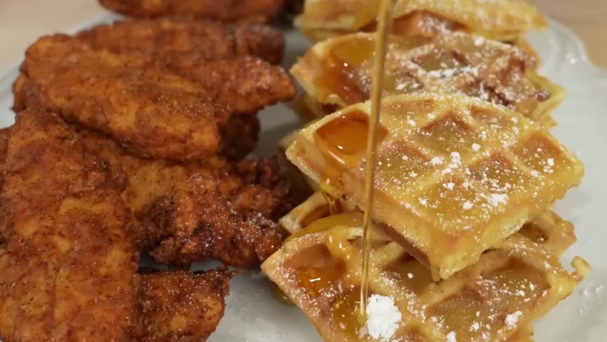 Chicken and waffles - Southern Style Chicken and Waffles, crispy fried chicken on fluffy waffles with syrup, a classic comfort brunch dish perfect for restaurants, indulgent meals, and family dining.
