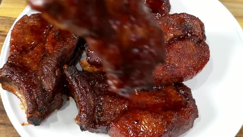 BBQ Country-Style Ribs, tender pork shoulder ribs slow-cooked and glazed in smoky barbecue sauce, perfect for cookouts, catering, casual dining, and food promotions.