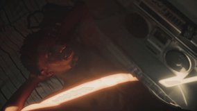 Shirtless Black man resting on bed with hands behind head and looking pensively upward illuminated by beam of sunlight in bedroom with analog boombox nearby. View from above - Powered by Shutterstock - Get 15% off with code: PIKWIZARD15