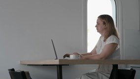 Focused Woman Working on Laptop in Minimalist Workspace - Powered by Shutterstock - Get 15% off with code: PIKWIZARD15