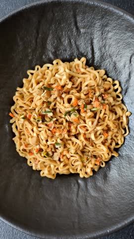 Instant noodles or ramen, Asian food, pasta with vegetables and spices. Noodles, takeaway food, instant meal