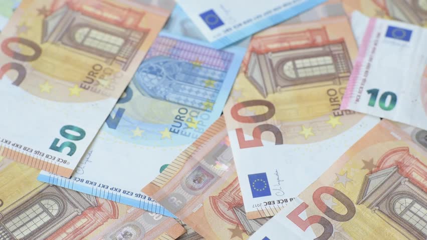 Paper money, euro notes, cash for savings, investments and business transactions. Euro paper cash as a financial background for your design