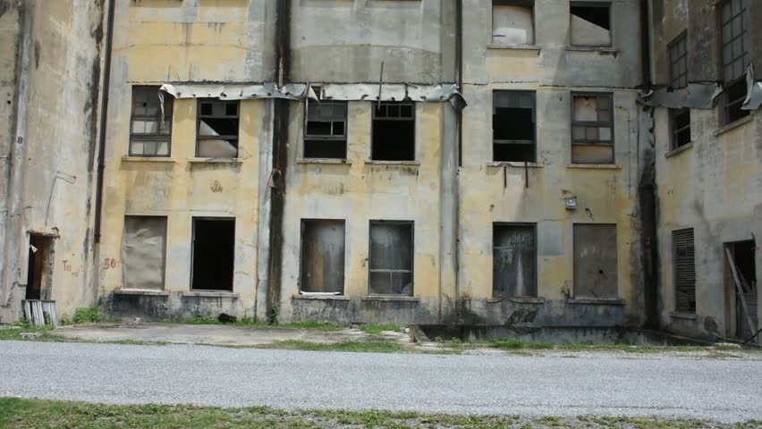 Traveler thai women people travel visit abandoned ruin ancient industrial building of Old Kanchanaburi Thai Paper Mill Industry Factory architecture of World War II landmarks in Kanchanaburi, Thailand