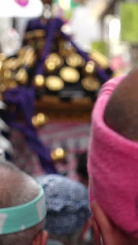 ASAKUSA, TOKYO,  JAPAN - MAY 20, 2019 : Scenery of SANJA MATSURI (SANJA FESTIVAL) on the mirror at the street in ASAKUSA.  Festival is one of the three great shinto festivals in Tokyo. Vertical video.