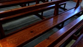 Sunlight shines on unoccupied pews inside a church, empty hall recorded in a calm and quiet moment. - Powered by Shutterstock - Get 15% off with code: PIKWIZARD15