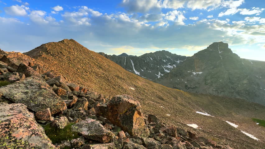 Mount of the Holy Cross 14er Rocky Mountain Sawatch Range Peak Colorado Alpine backcountry landscape view from Notch Mountain Shelter Halo Ridge spring summer Golden hour sunset left motion