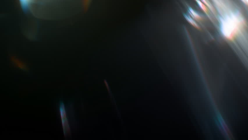 Real Shooted Cinematic Lens Flare Overlay on Black Background at 1000fps Slow Motion.