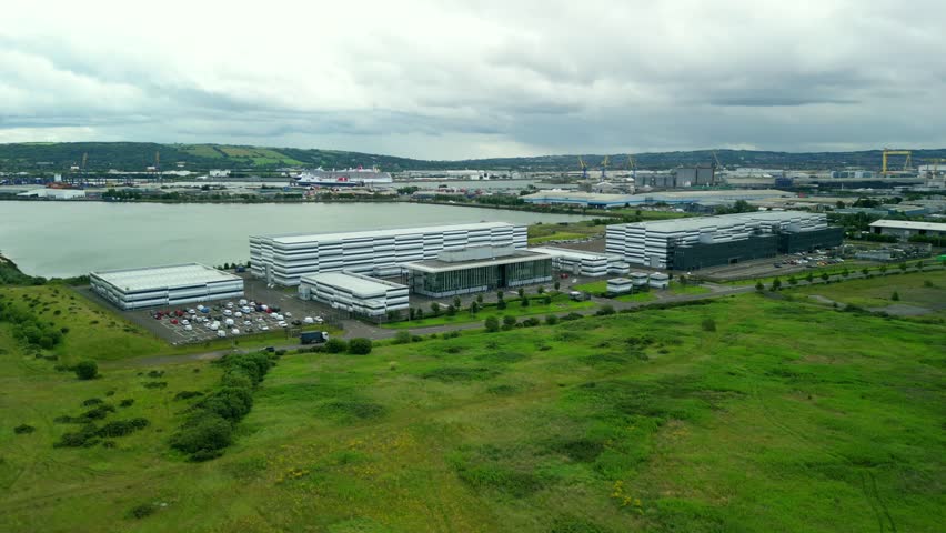 4K clockwise aerial of Studio Ulster, a virtual production studio in Belfast, Northern Ireland. Filmed at 30FPS and with Rec709 color.