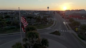 aerial flying by american flag ocean isle beach nc - Powered by Shutterstock - Get 15% off with code: PIKWIZARD15