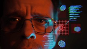 A man with glasses looks at a glowing augmented reality HUD interface. The futuristic scene highlights biometric scanning, technology, and advanced cyber systems. - Powered by Shutterstock - Get 15% off with code: PIKWIZARD15