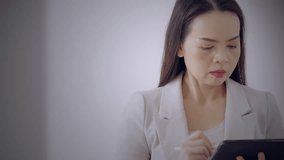 Asian businesswoman interacting with real-time virtual dashboard showing data loading bar, global chart, and multiple analytics elements. Concept of digital processing and smart decision making. - Powered by Shutterstock - Get 15% off with code: PIKWIZARD15