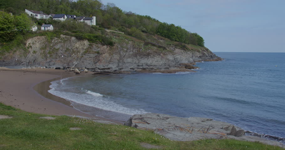 Panning wide shot of Aberporth bay at Aberporth