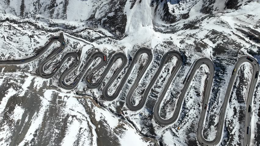 Los Caracoles highway road near Santiago Chile in aerial view. Snow highway road.