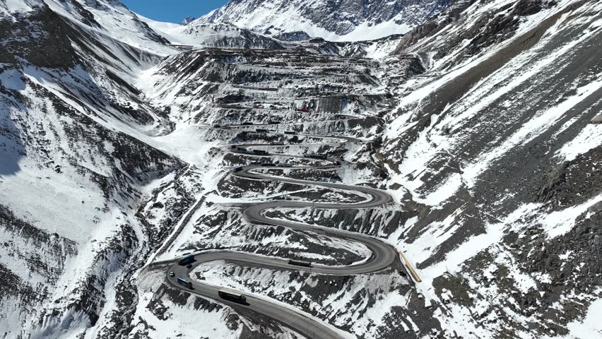 Los Caracoles highway road near Santiago Chile in aerial view. Snow highway road.